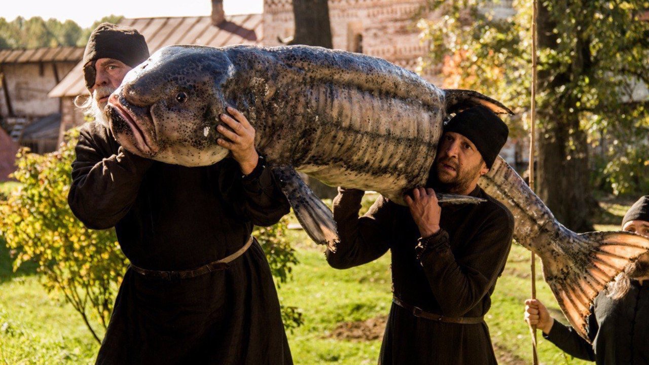 Монах и бес постер
